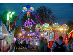 Fairground Christmas color light show lights up theme park